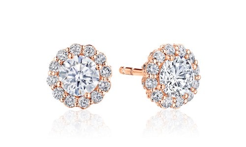 Rose gold diamond studs featuring an attractive halo resembling flower petals. Design by TACORI