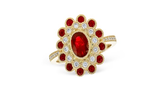 Gold cocktail ring set with rubies and diamonds