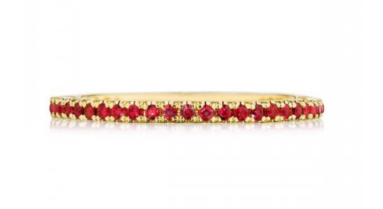 Yellow gold wedding band lined with rubies