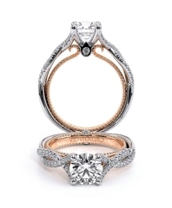 A mixed-metal engagement ring from Verragio features a round-cut diamond