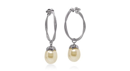 a silver pair of drop hoops featuring dangling pearls