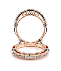 A rose gold diamond women’s wedding band from Verragio with side details.