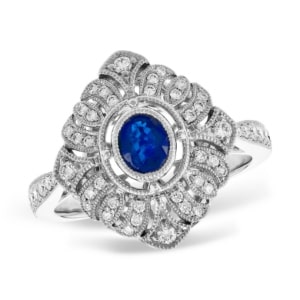 A vintage sapphire cocktail ring with diamond accents from Allison-Kaufman.