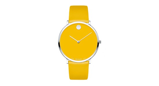 a bold, bright yellow watch by Movado with a blank face except for a circle at the 12 o’clock mark