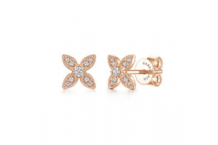 A close-up of dazzling rose gold and diamond stud earrings, available at Hannoush Jewelers.