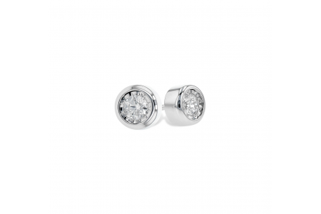 A close-up of diamond bezel earrings, available at Hannoush Jewelers.