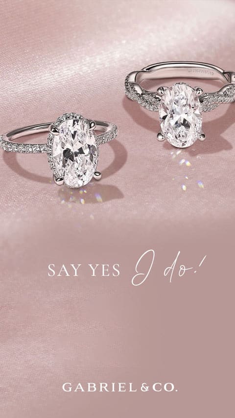 Two Engagement Rings with Oval Cut Diamonds